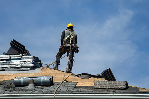 Professional Roofing technician working in Logan, UT